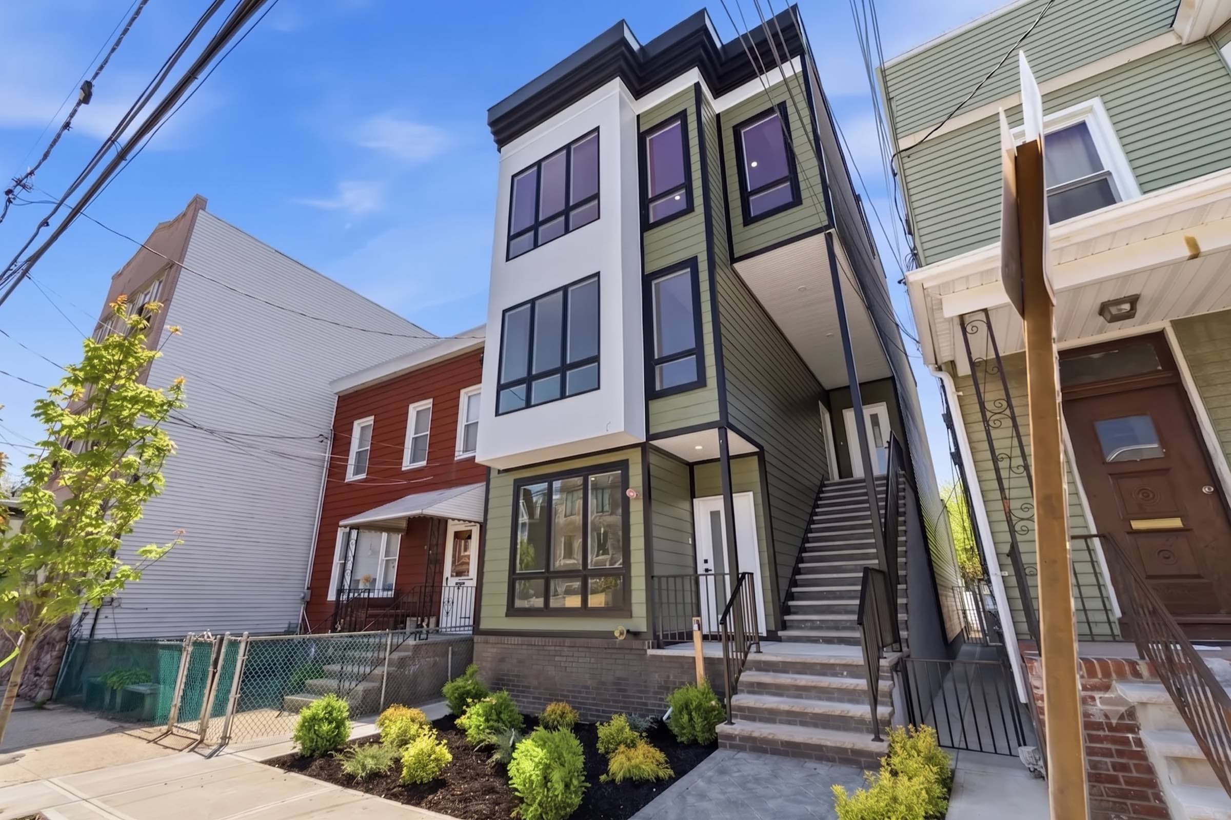 A newly built New Jersey townhouse on an urban street